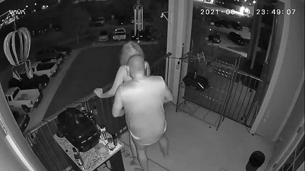 Couple caught on the balcony