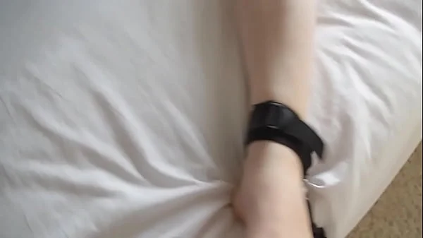 Busty Teen Scarlet struggles to free herself after being tied down to the bed.